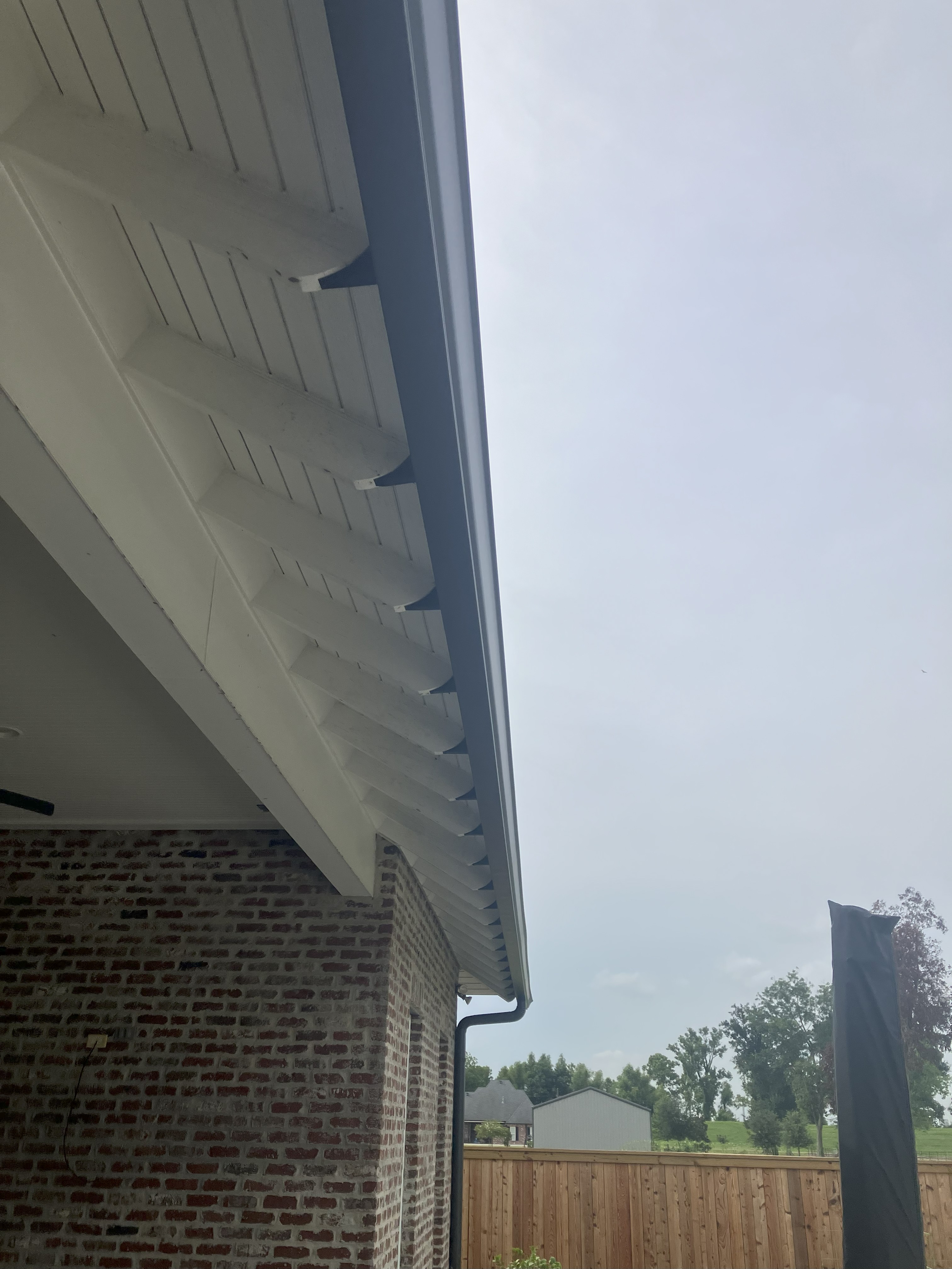 Installed gutter wedge example on fascia